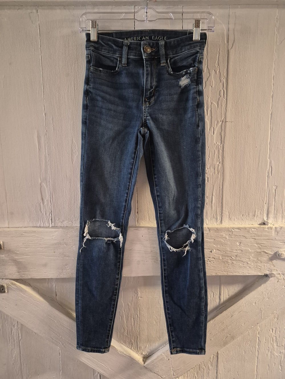 American Eagle Size 0 Distressed Dark Blue Jeans with stretch mid- rise EUCThes